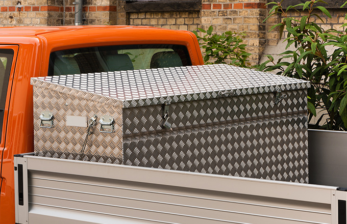 tool box on back of orange truck