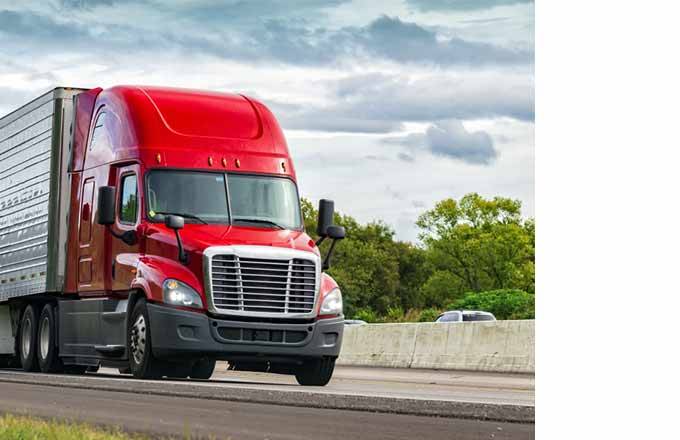 red tractor trailer (heavy duty truck)