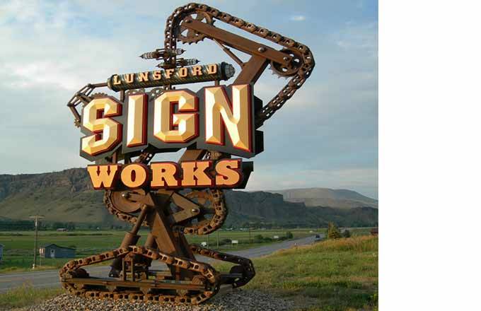 Sign works sign built with adhesives